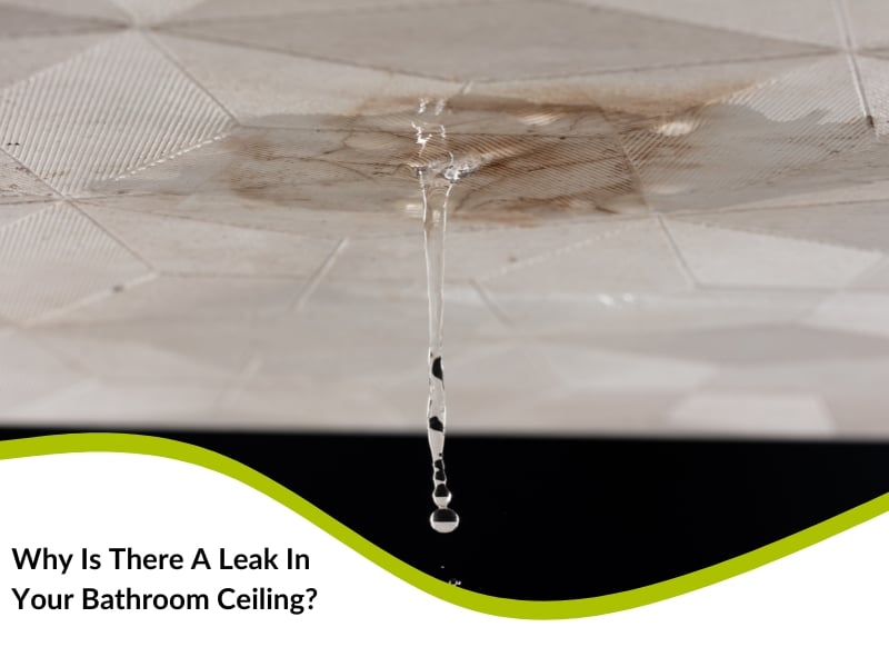 Close-up of water dripping from bathroom ceiling, indicating leak in bathroom ceiling issues.