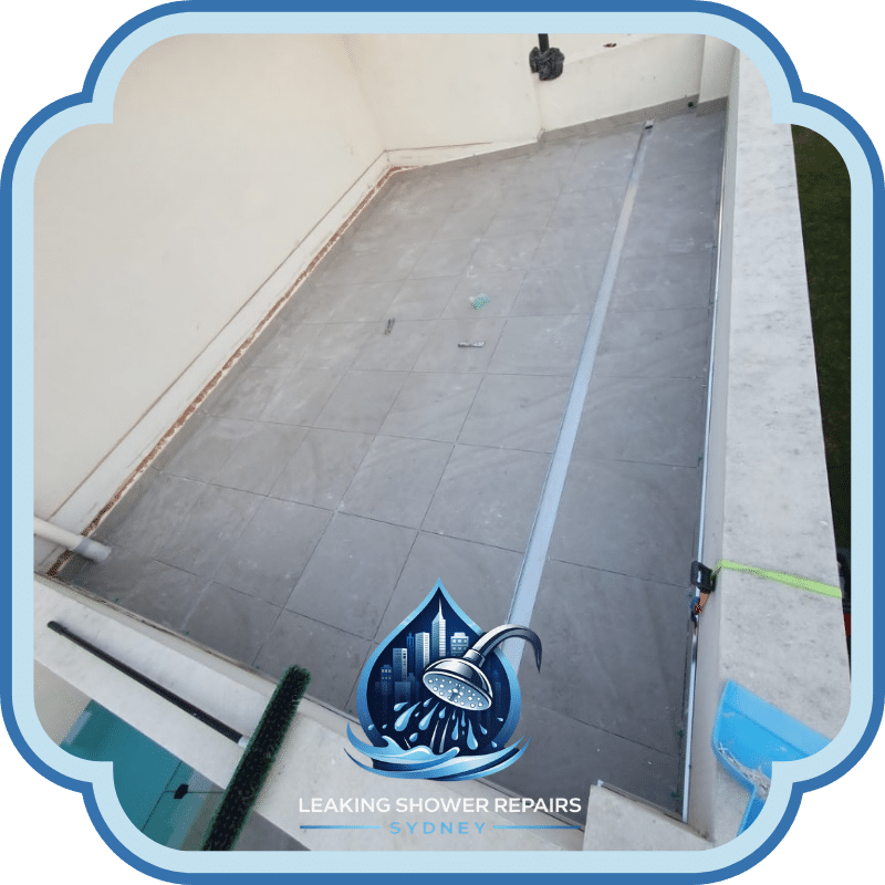 Leaking Rooftop Repairs Services showing tiled rooftop balcony with drainage channel, sealed edges, and waterproofed surface on a residential property.