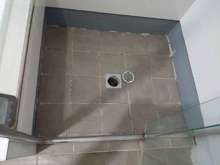 Technician resealing a shower in Canterbury-Bankstown without removing tiles