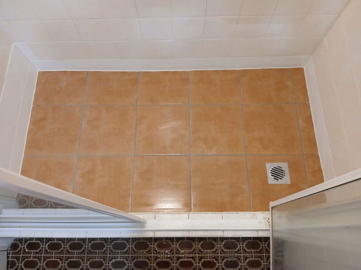 Technician resealing a shower in Parramatta without removing tiles